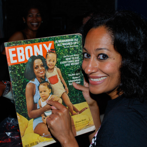 Tracee Ellis Ross with photo of herself and mother Diana Ross, Detroit, 2008