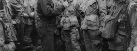 General Dwight Eisenhower speaks with men of the 502nd Parachute Infantry Regiment, part of the 101st Airborne Division, on June 5, 1944, the day before the D-Day invasion.