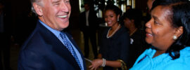 Joe Biden smiling broadly and warmly while greeting people